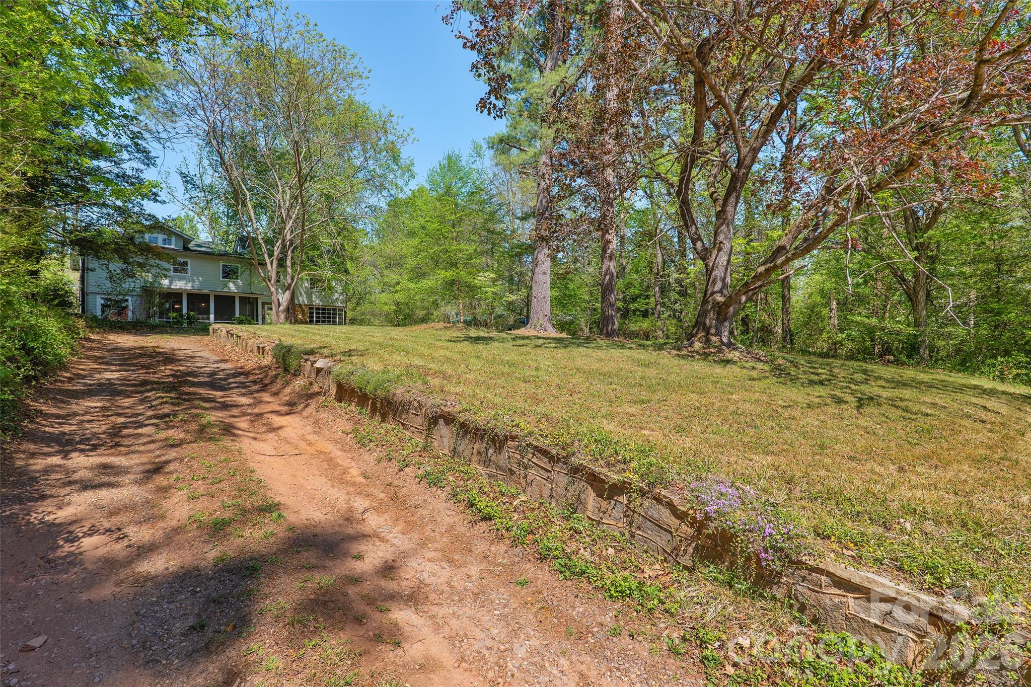 112 Candler School Road Candler, NC 28715 - Photo 37 of 37 a view of a yard with a tree