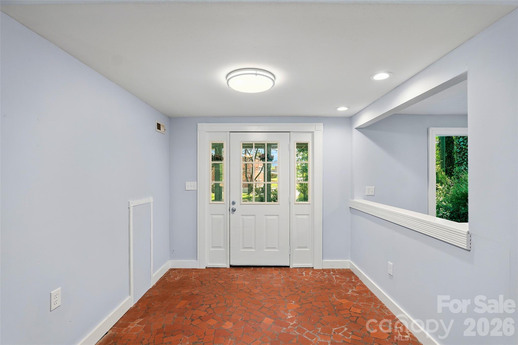 112 Candler School Road Candler, NC 28715 - Photo 7 of 37 wooden floor in an empty room with a window