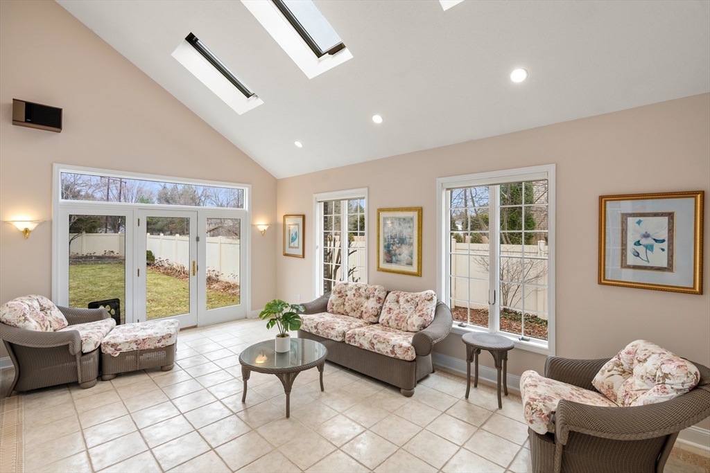 50 Stock Farm Road Sudbury, MA 01776 - Photo 17 of 40 a living room with furniture and large windows