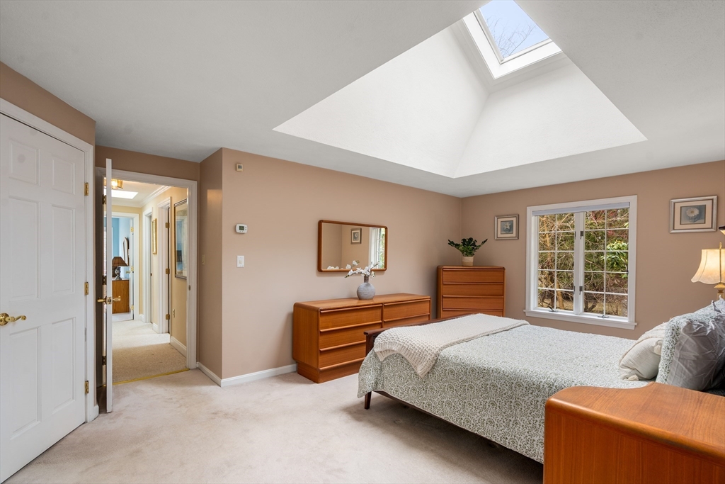 50 Stock Farm Road Sudbury, MA 01776 - Photo 19 of 40 a bedroom with a bed and a couch