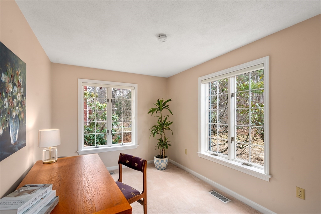 50 Stock Farm Road Sudbury, MA 01776 - Photo 20 of 40 a view of a livingroom with furniture wooden floor and a window