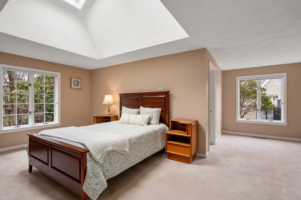 50 Stock Farm Road Sudbury, MA 01776 - Photo 22 of 40 a bedroom with a bed and a window with outer view