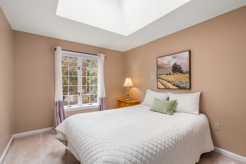 50 Stock Farm Road Sudbury, MA 01776 - Photo 23 of 40 a bedroom with a bed and a window