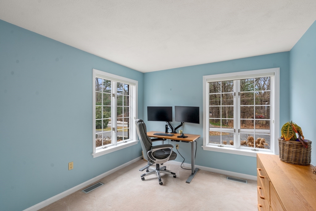 50 Stock Farm Road Sudbury, MA 01776 - Photo 26 of 40 a view of a workspace with furniture and a window