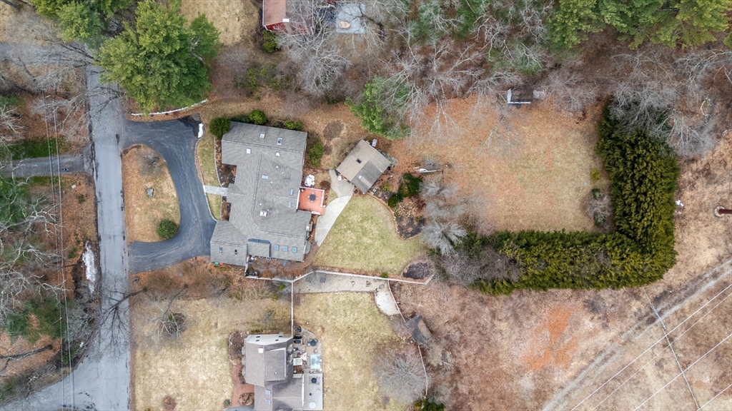 50 Stock Farm Road Sudbury, MA 01776 - Photo 35 of 40 an aerial view of a house with a yard