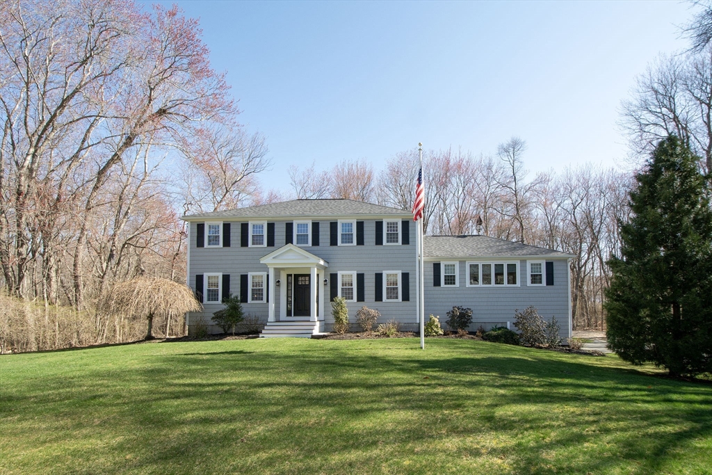 18 Longmeadow Road Scituate, MA 02066 - Photo 1 of 37 a front view of a house with a garden