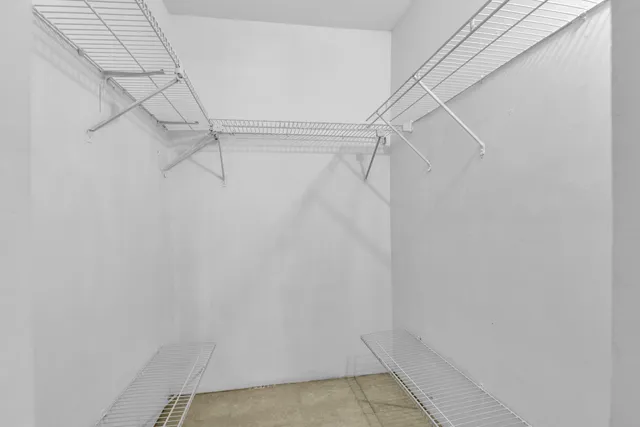 a view of a room with racks on the wall