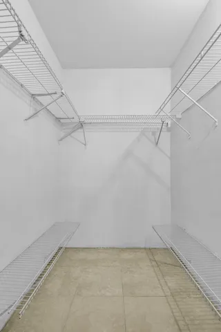 a view of a room with racks on the wall