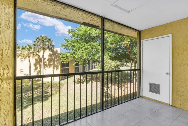 a view of a large window with an outdoor space