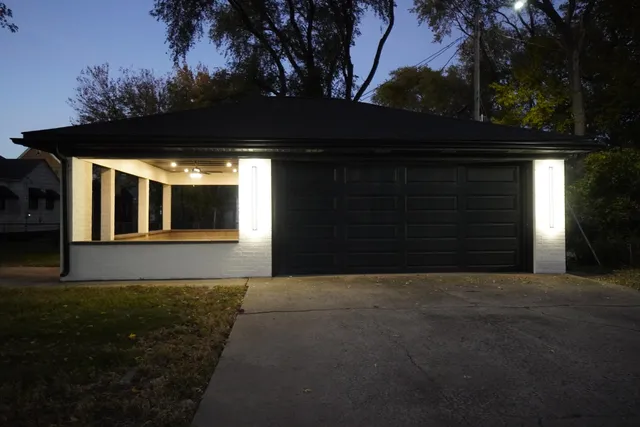 a view of an empty room with a fireplace