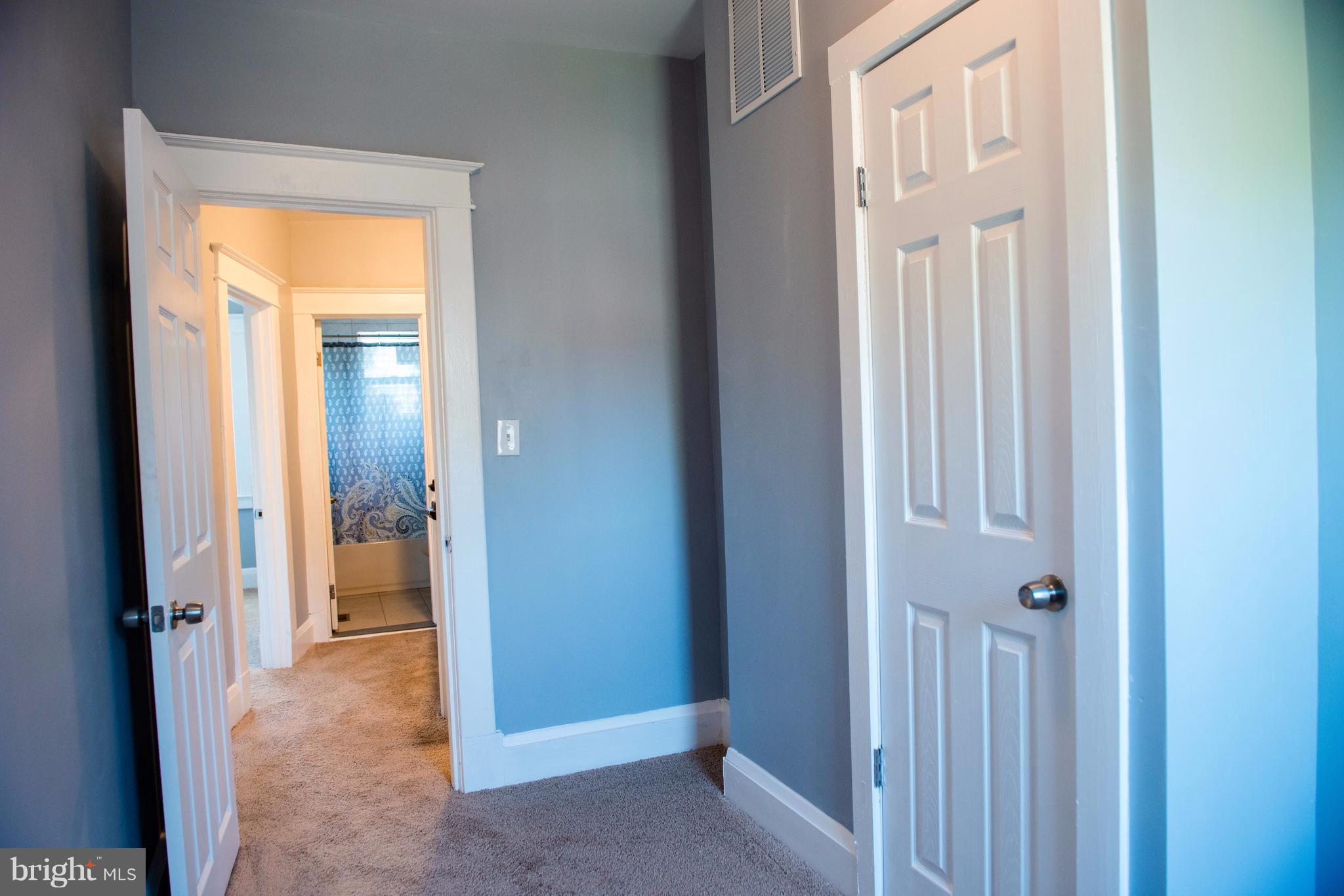 764 Edgewood Street Baltimore, MD 21229 - Photo 15 of 25 a view of a bathroom from a hallway