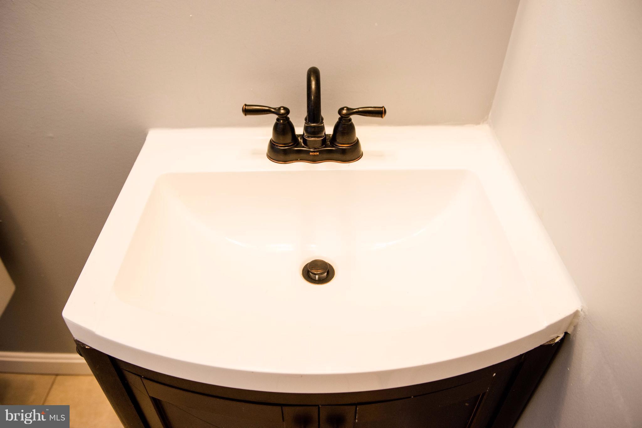 764 Edgewood Street Baltimore, MD 21229 - Photo 17 of 25 a close view of sink