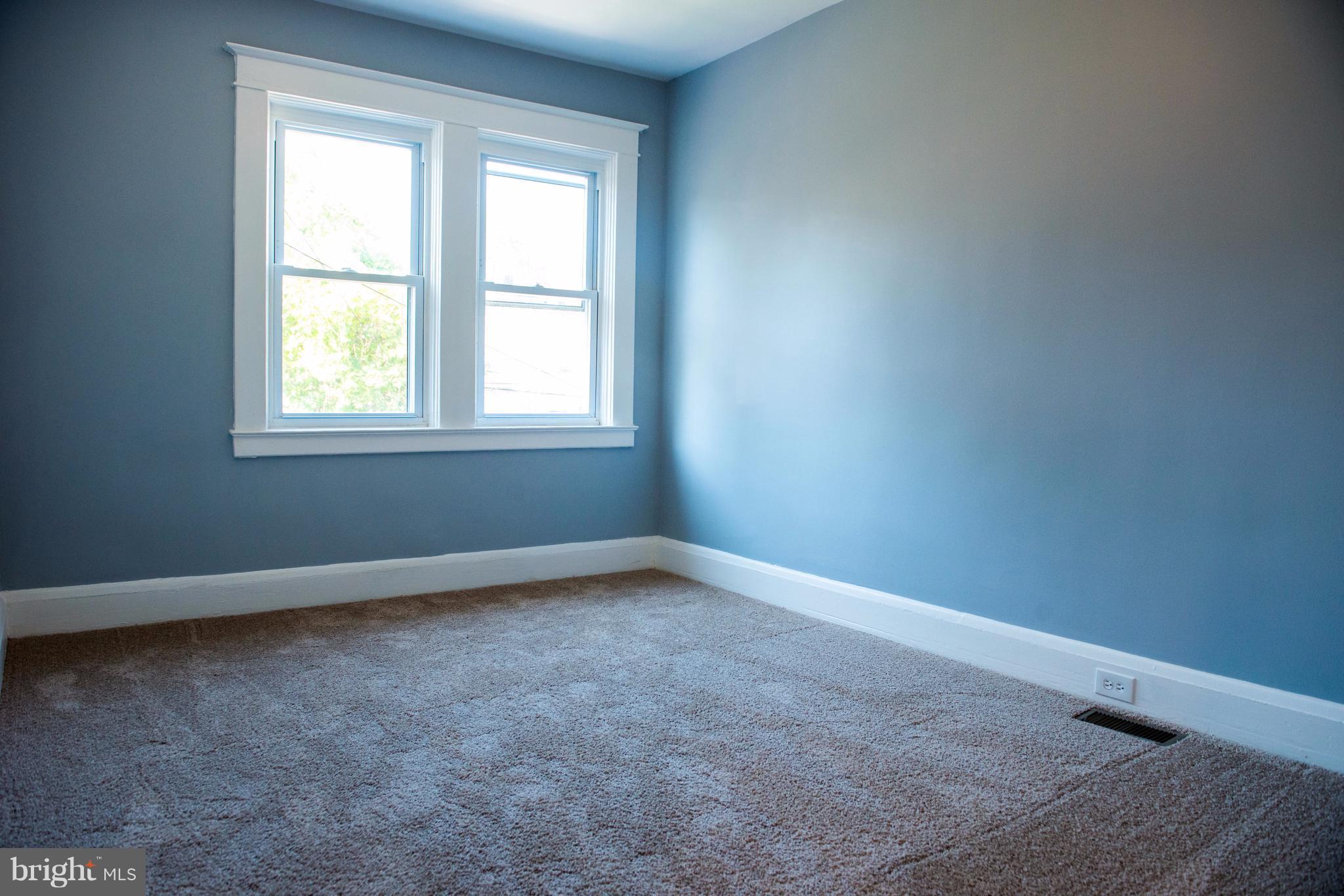 764 Edgewood Street Baltimore, MD 21229 - Photo 19 of 25 an empty room with a window
