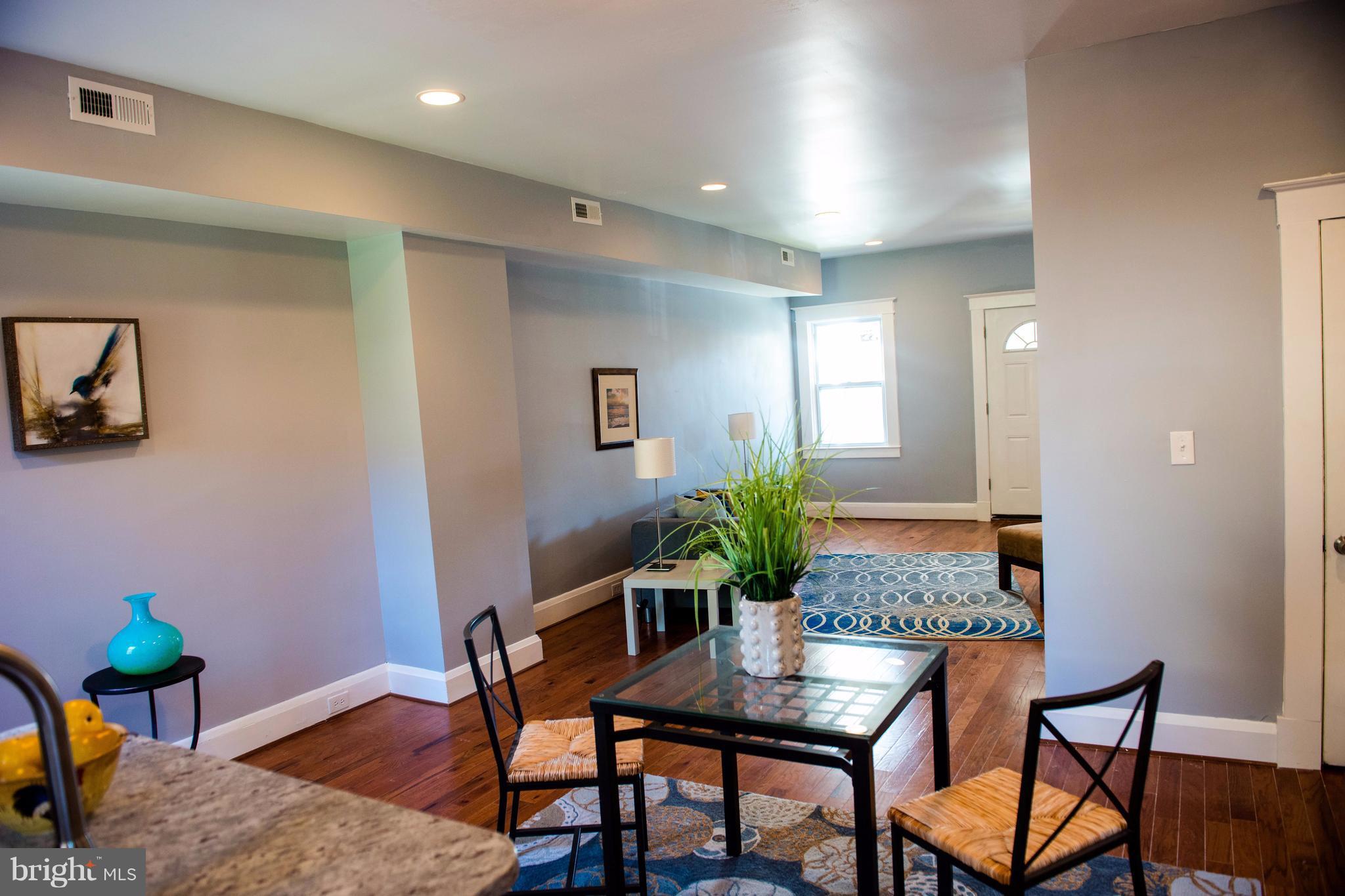 764 Edgewood Street Baltimore, MD 21229 - Photo 5 of 25 a view of a dining room with furniture