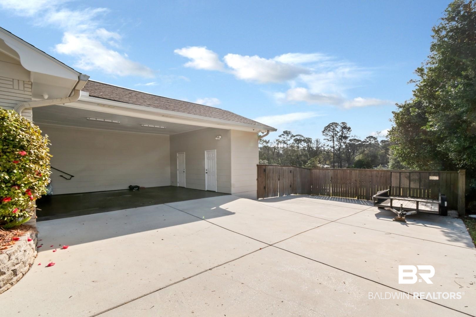 231 Rochester Road Mobile, AL 36608 - Photo 49 of 51 View of patio / terrace featuring driveway and an attached carport