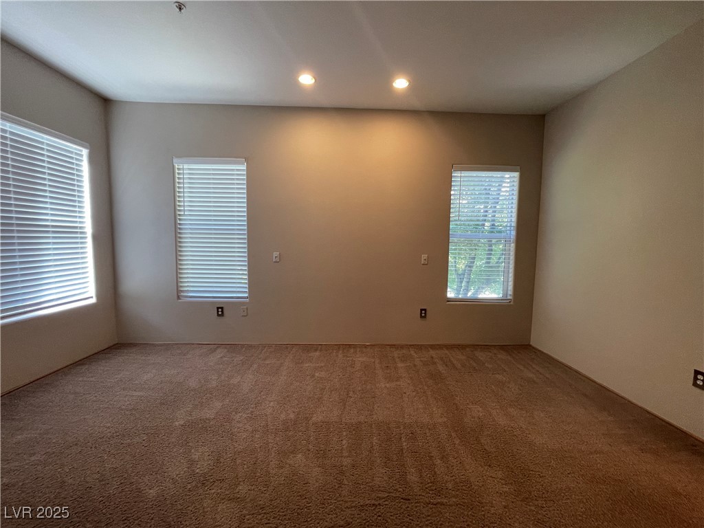 68 East Serene Avenue, Unit 225 Las Vegas, NV 89123 - Photo 15 of 22 Carpeted spare room featuring recessed lighting