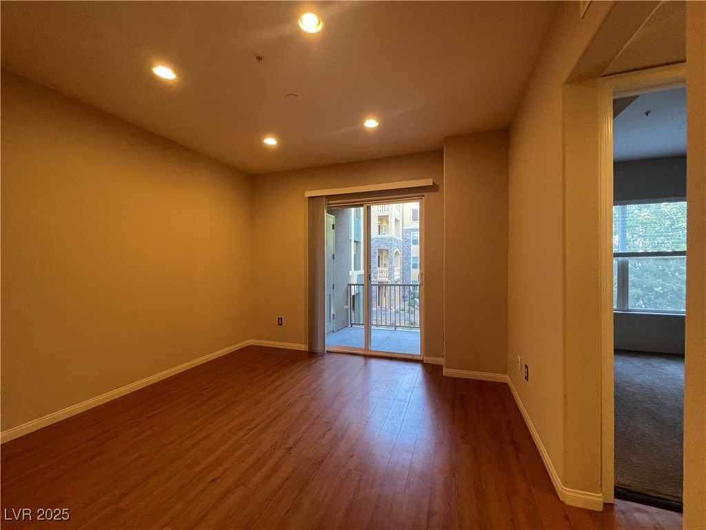 68 East Serene Avenue, Unit 225 Las Vegas, NV 89123 - Photo 6 of 22 Spare room featuring recessed lighting and wood finished floors