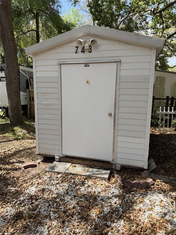 3000 Clarcona Road, Unit 743 Apopka, FL 32703 - Photo 10 of 54 a white house with a outdoor space