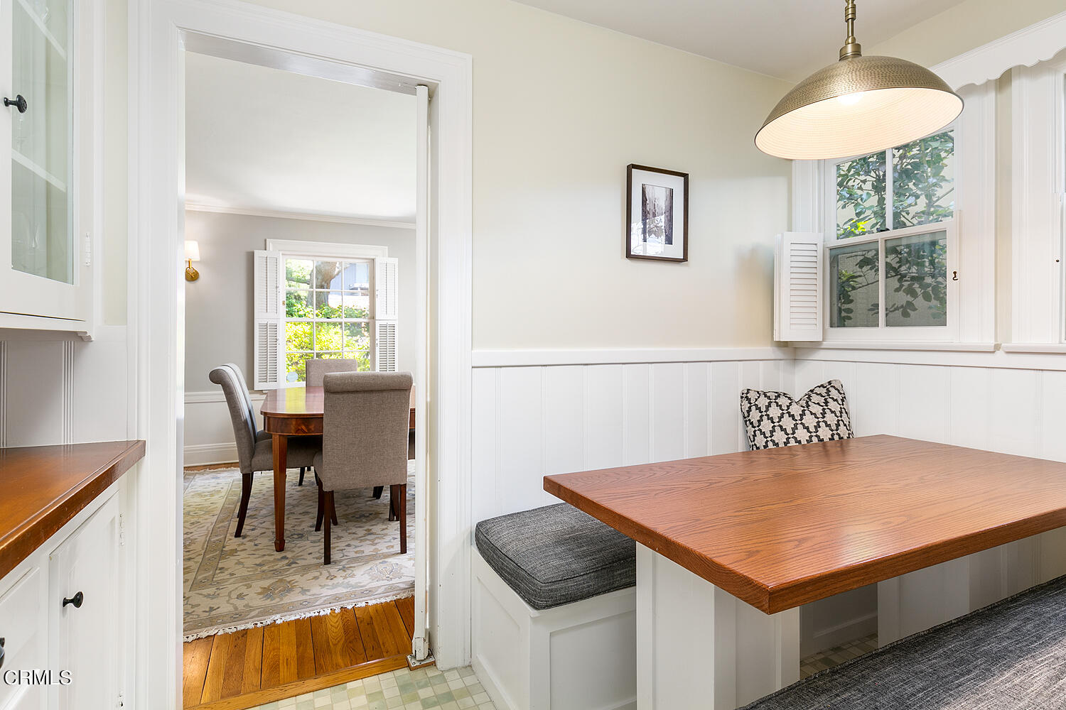 150 Club Road Pasadena, CA 91105 - Photo 8 of 24 a kitchen with a table chairs and a chandelier