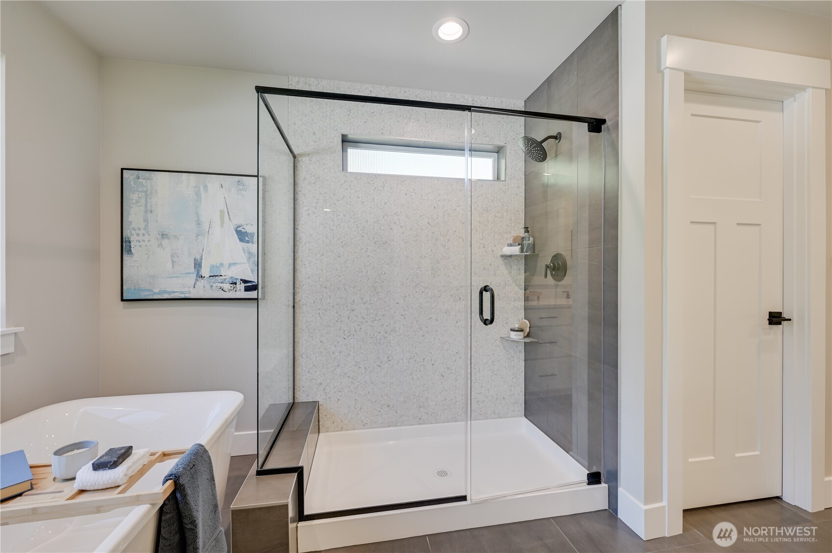 19231 Meridian Drive Southeast, Unit CW 13 Bothell, WA 98012 - Photo 33 of 36 a bathroom with a bathtub and a shower