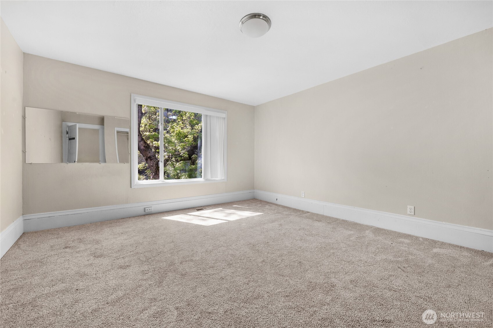 924 3rd Avenue West Seattle, WA 98119 - Photo 11 of 18 an empty room with windows