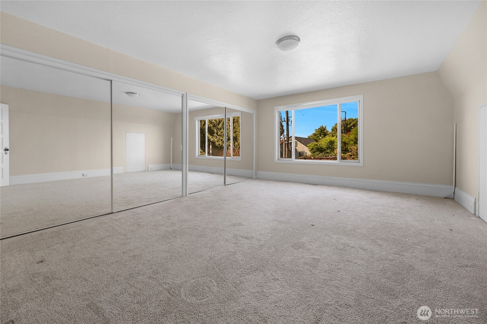 924 3rd Avenue West Seattle, WA 98119 - Photo 12 of 18 a view of an empty room with a window