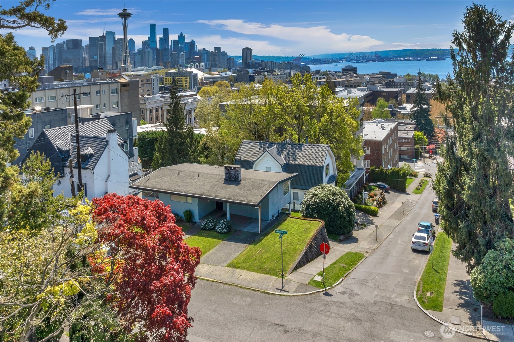924 3rd Avenue West Seattle, WA 98119 - Photo 15 of 18 a view of a houses with a yard and potted plants