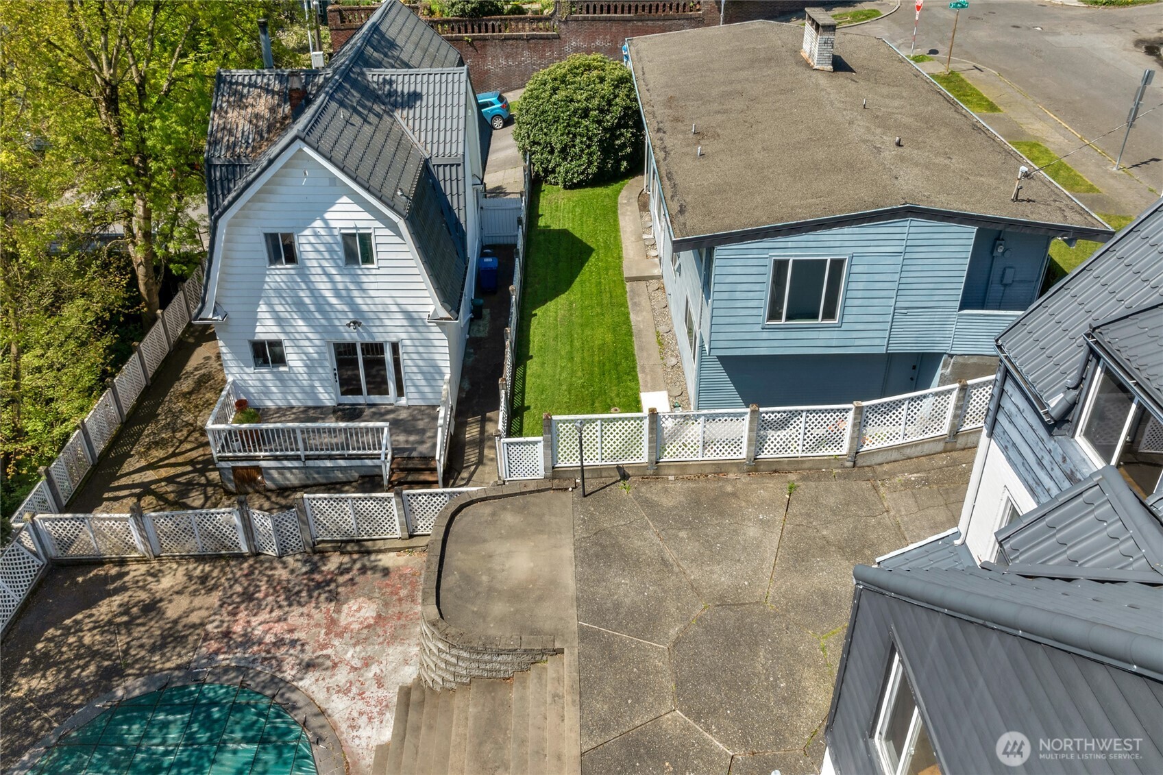924 3rd Avenue West Seattle, WA 98119 - Photo 4 of 18 an aerial view of a house with large trees