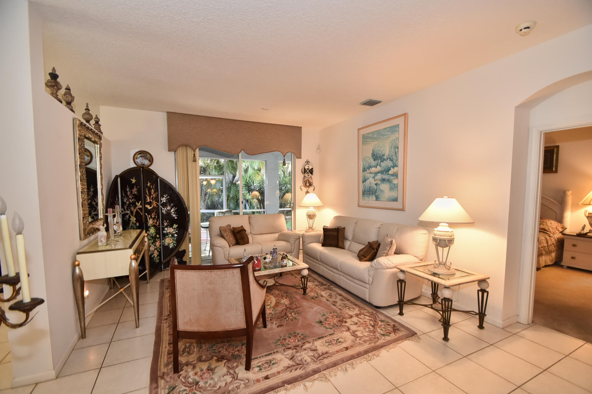 5916 Seashell Terrace Boynton Beach, FL 33437 - Photo 6 of 31 a living room with furniture and a window