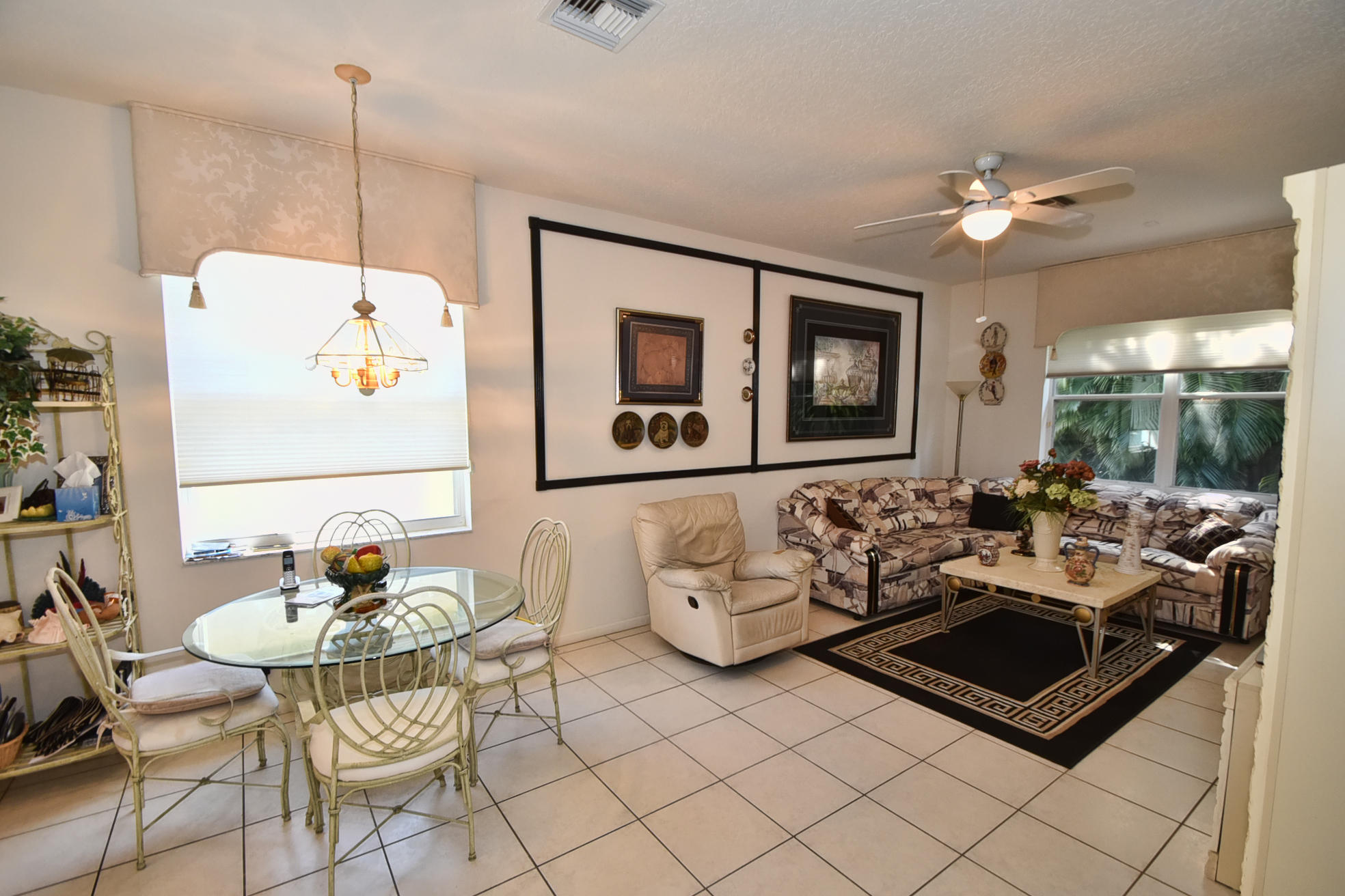 5916 Seashell Terrace Boynton Beach, FL 33437 - Photo 8 of 31 a living room with furniture and window