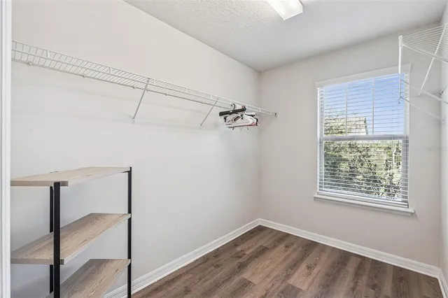 a view of a room with racks on the wall