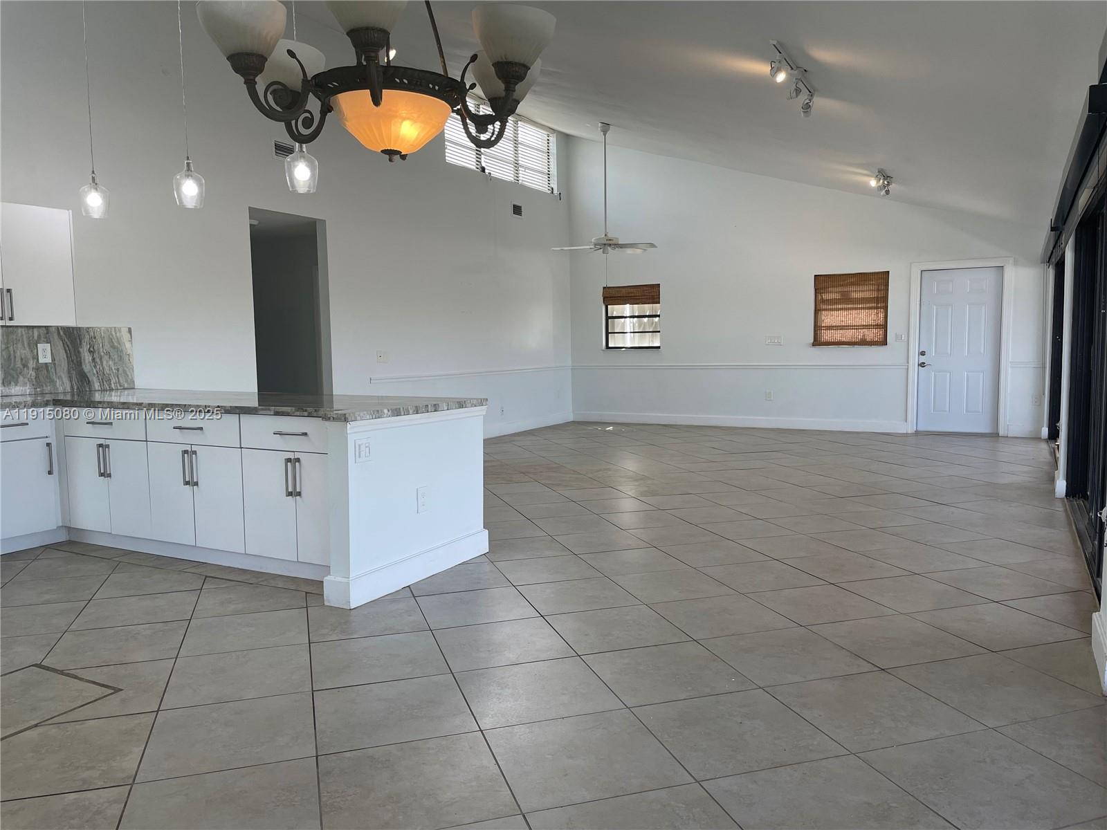 26 South Exuma Road, Unit B Key Largo, FL 33037 - Photo 3 of 6 a kitchen with a cabinets and appliances