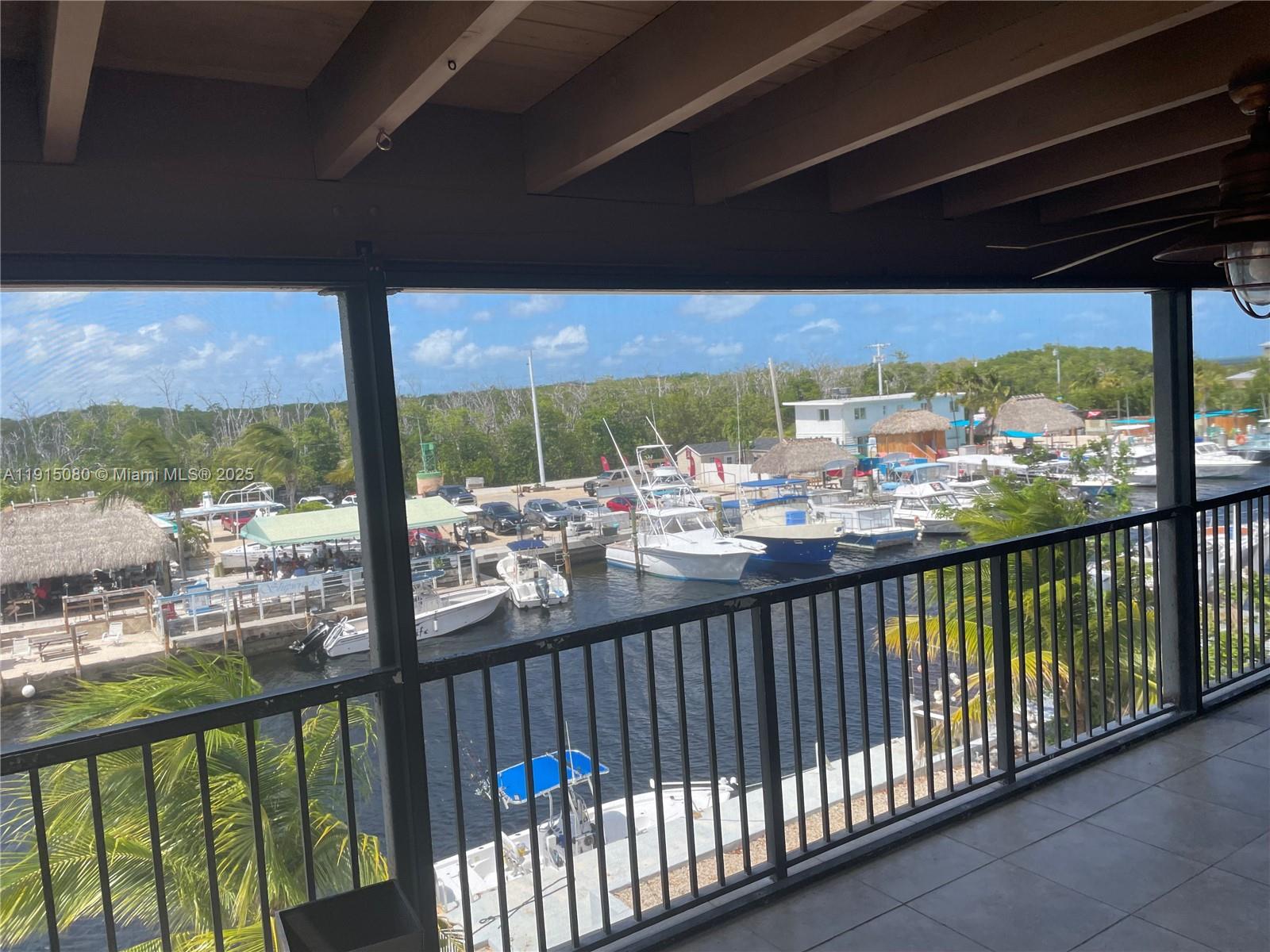 26 South Exuma Road, Unit B Key Largo, FL 33037 - Photo 6 of 6 a view of a street from a balcony
