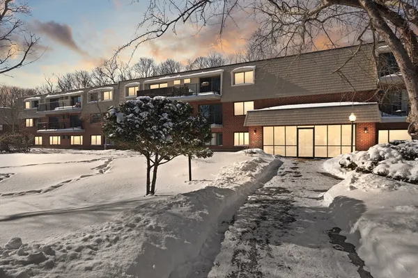 a view of a house with a snow