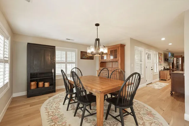 a view of house with a yard