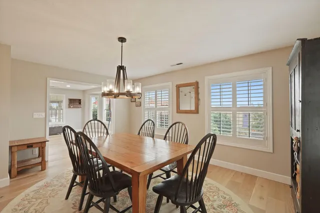 a view of a house with a yard and garage