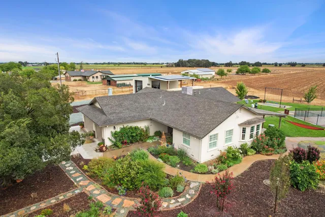 a view of a lake with a yard