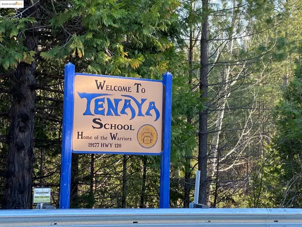 a sign broad on the side of the road