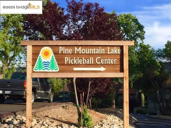 a view of outdoor space with garden and seating area