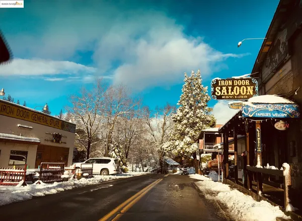 a street view with tall buildings