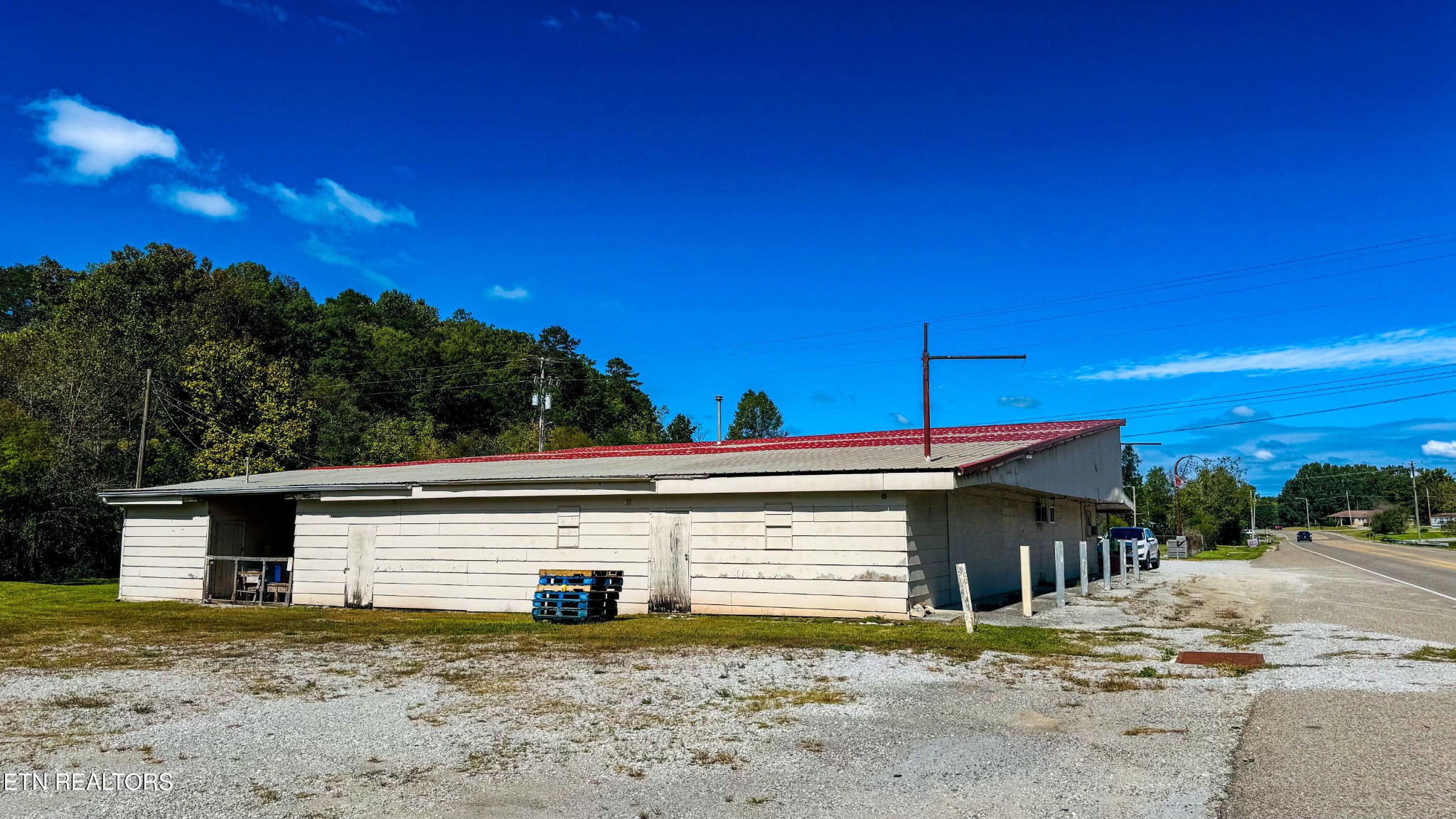 610 Paint Rock Road Oneida, TN 37841 - Photo 12 of 32 a view of a house with a yard and garage