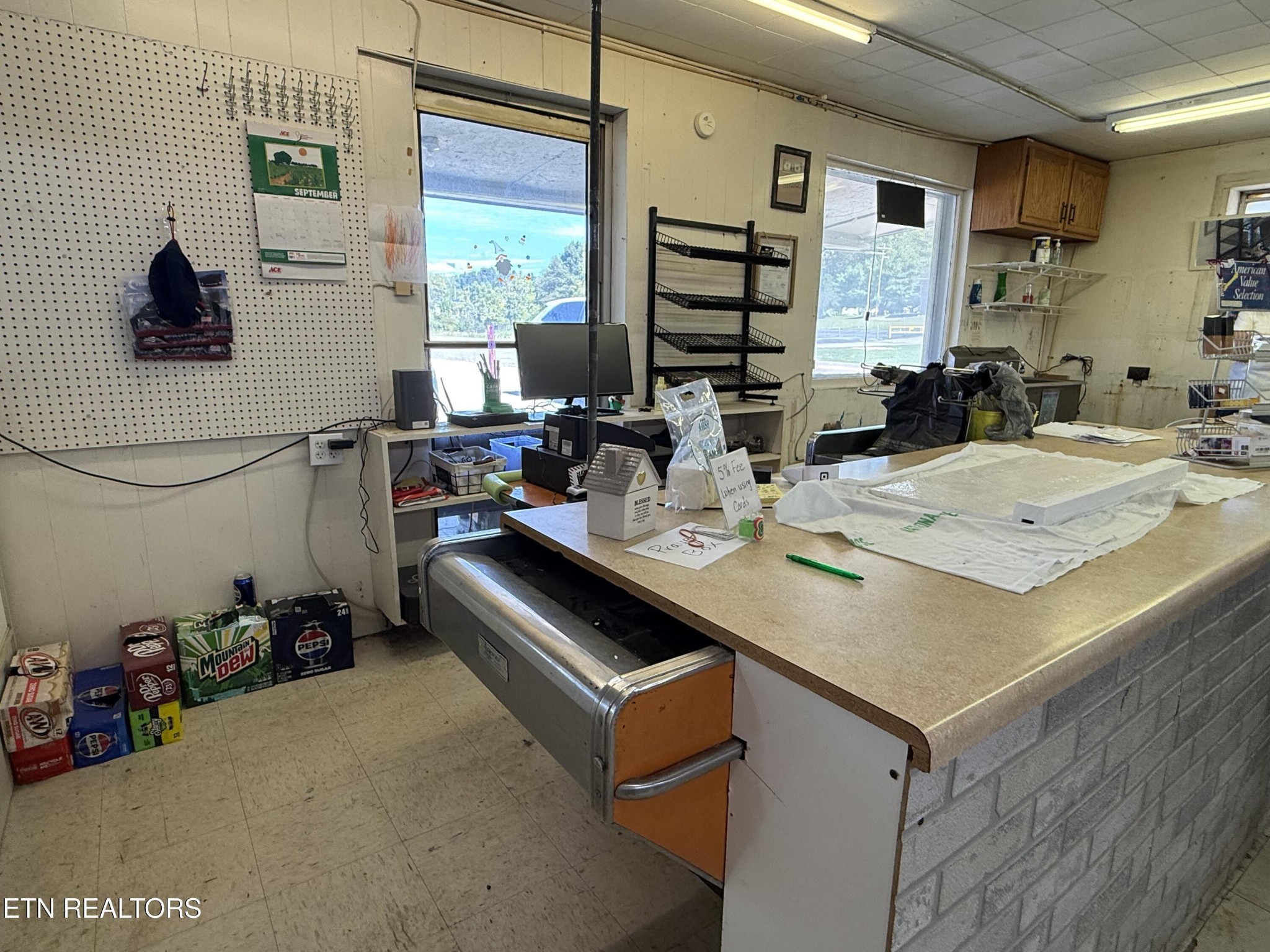 610 Paint Rock Road Oneida, TN 37841 - Photo 21 of 32 a kitchen with a sink appliances and cabinets