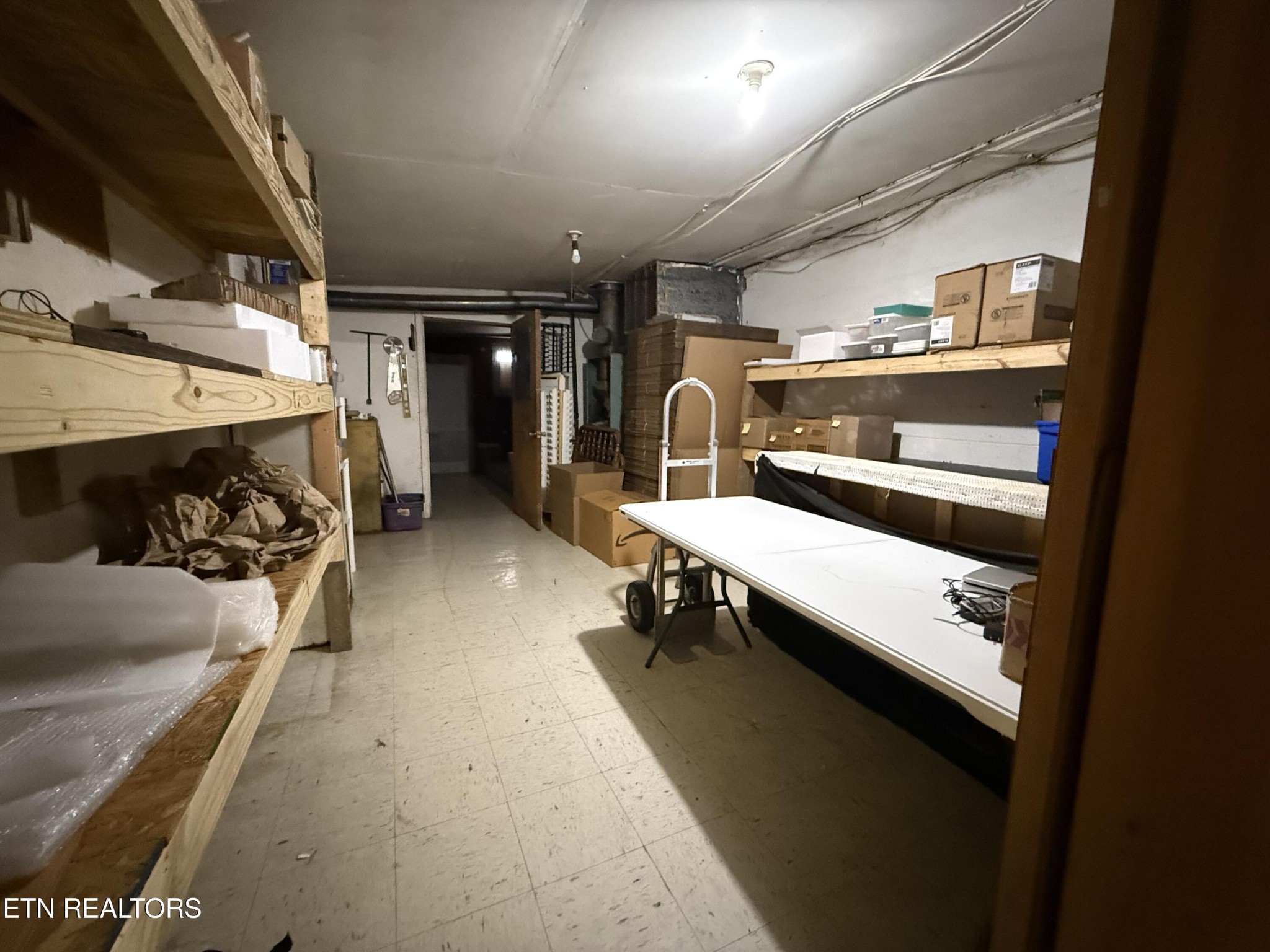 610 Paint Rock Road Oneida, TN 37841 - Photo 26 of 32 a room with stainless steel appliances kitchen island granite countertop lots of clutter and stainless steel appliances