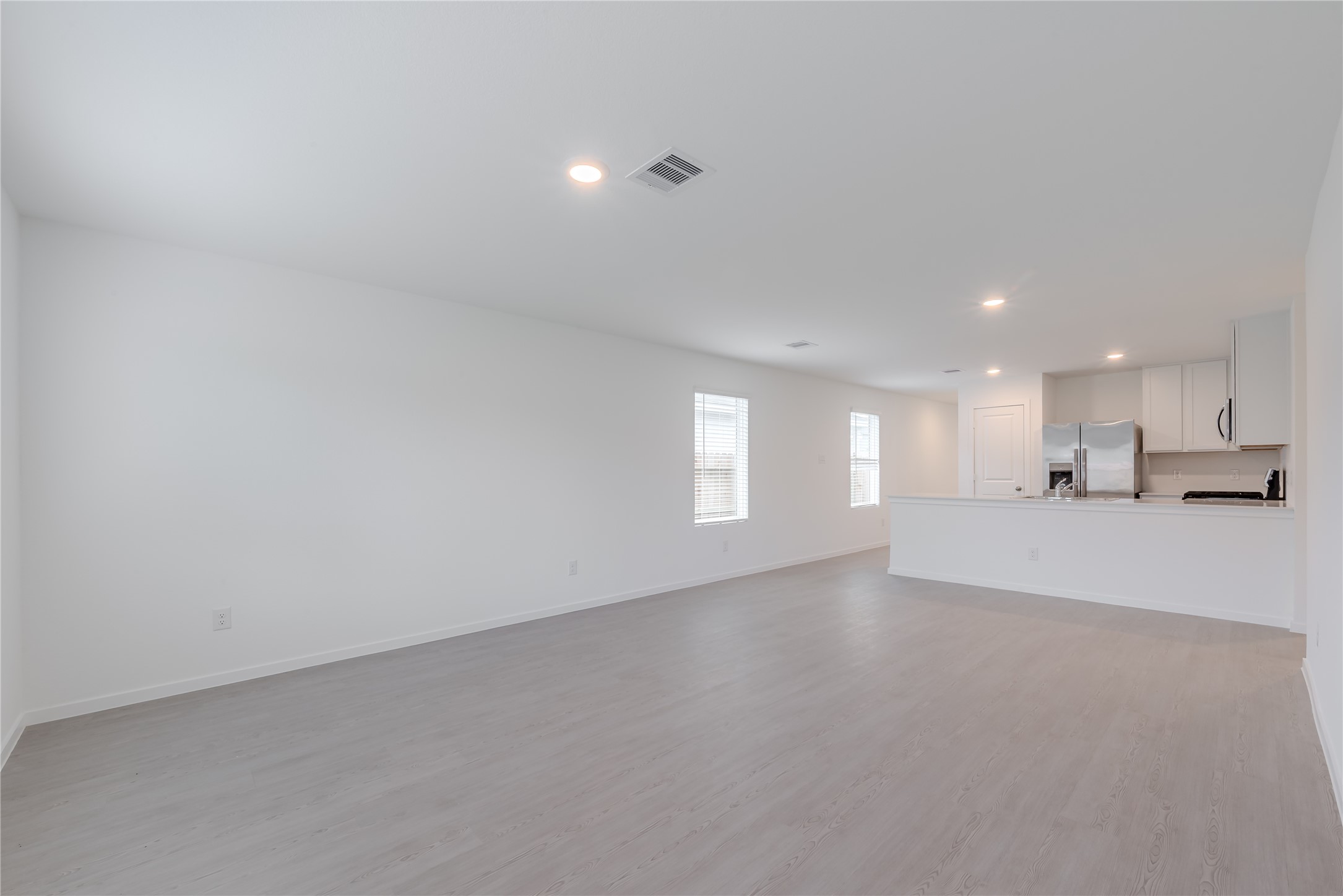 21358 Offida Lane New Caney, TX 77357 - Photo 13 of 26 a view of a kitchen with a sink and a window
