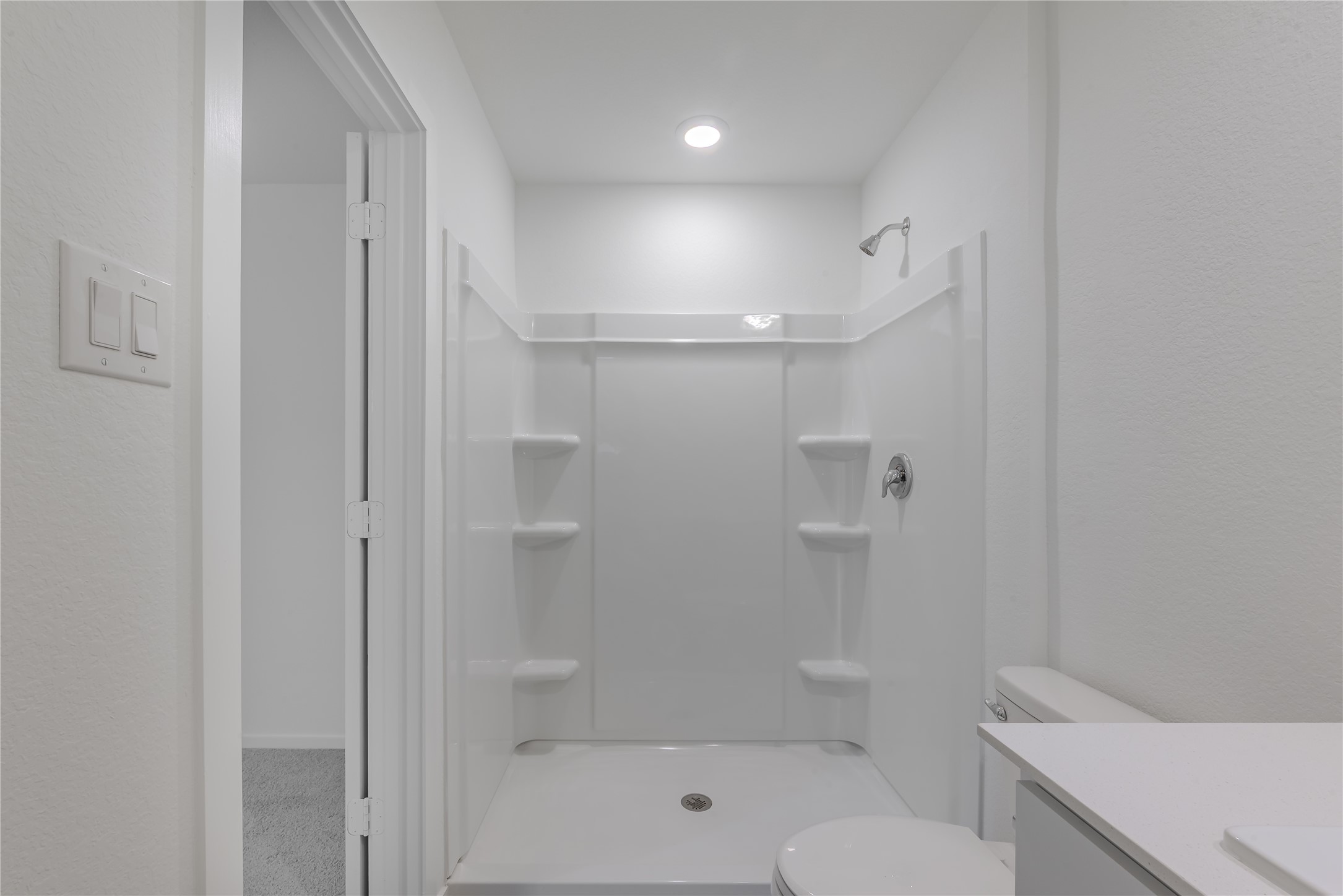 21358 Offida Lane New Caney, TX 77357 - Photo 17 of 26 a bathroom with a shower a toilet and sink