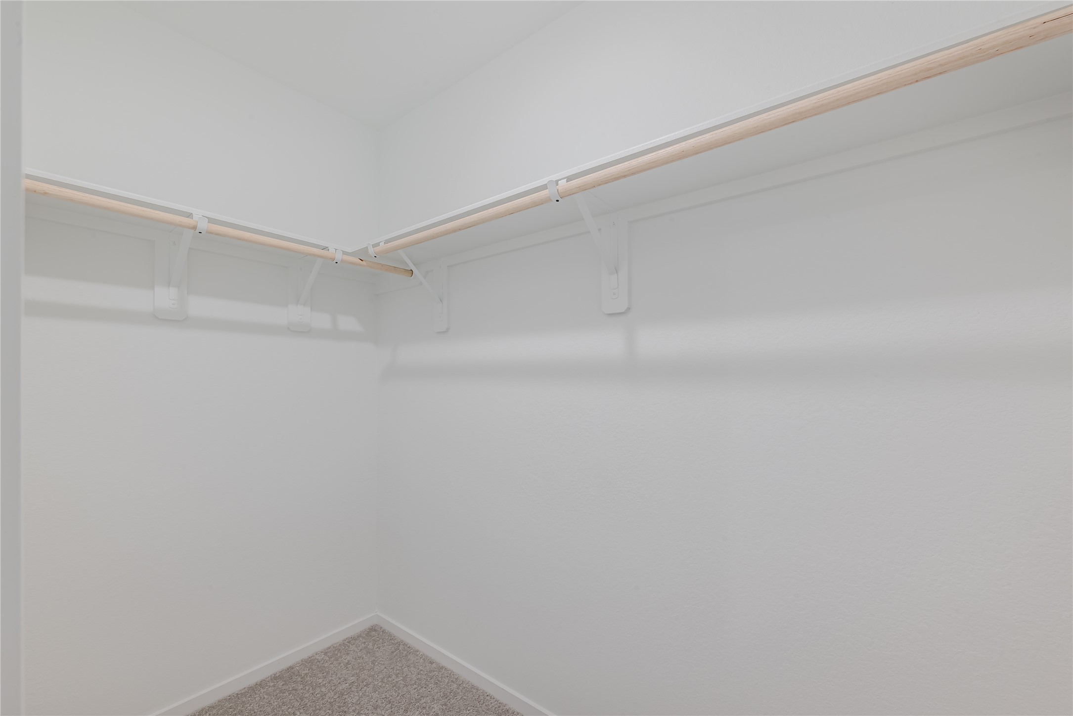 21358 Offida Lane New Caney, TX 77357 - Photo 18 of 26 a view of an empty walk in closet