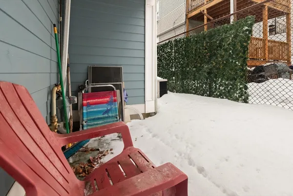 a view of a bench in front of a building