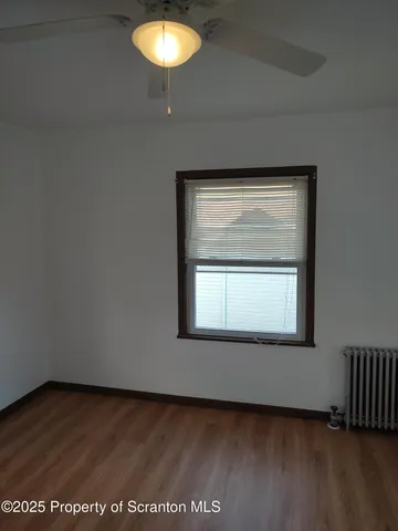 a view of a livingroom with a window