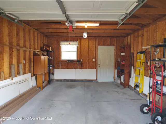 a view of a pathway with a wrought iron stairs