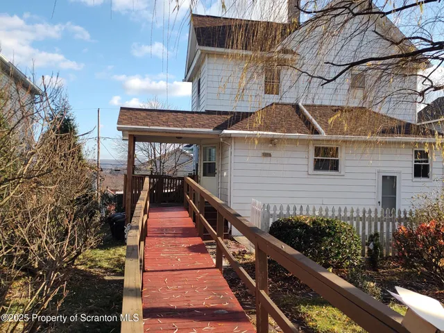 a view of street with houses